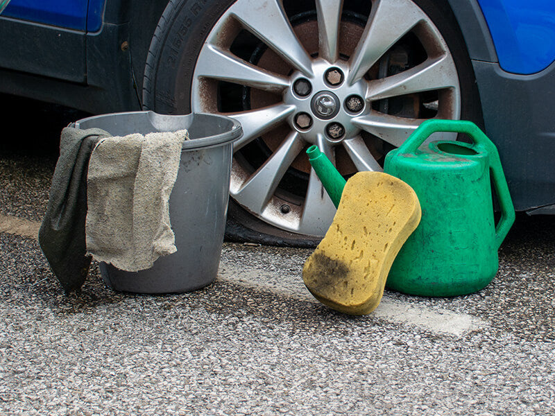 Household items to avoid — kitchen sponge, bath towel, rough cloth that can damage automotive paint