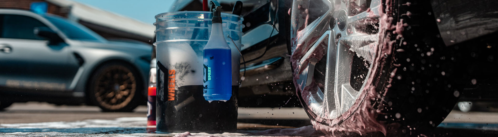 Cleaning alloy wheels with a wheel brush and wheel cleaner