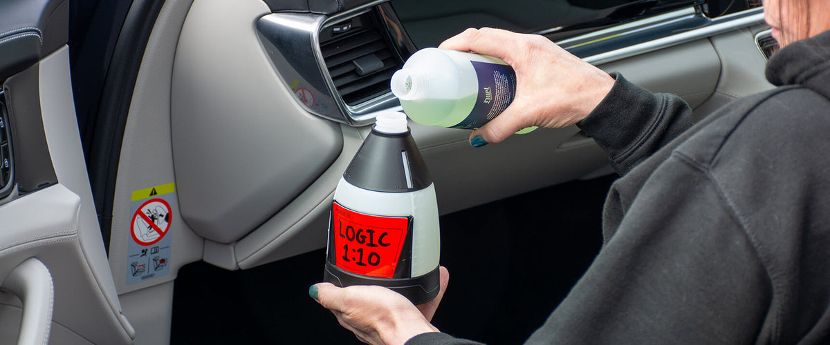 APC concentrate being measured into a dilution bottle