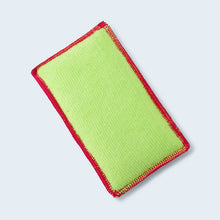 Duel scrub pad top side showing red stitching 