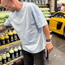 Duel Autocare MIB Oversized T-Shirt front sky blue being worn at gravity