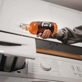 Duel Laundry being poured into detergent draw in washing machine