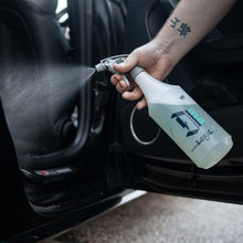 Logic interior app being sprayed with a Duel professional dilution bottle